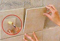 Укладка плитки на стену